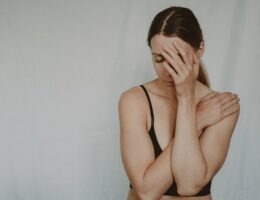 young sad woman with closed eyes