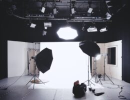 photo studio with white wooden framed wall mirror